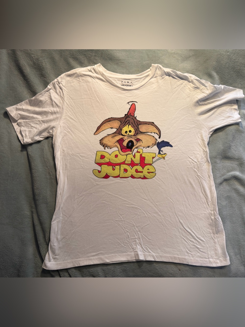Zara White Short Sleeve Tee with Coyote Graphic and Yellow & Red Text